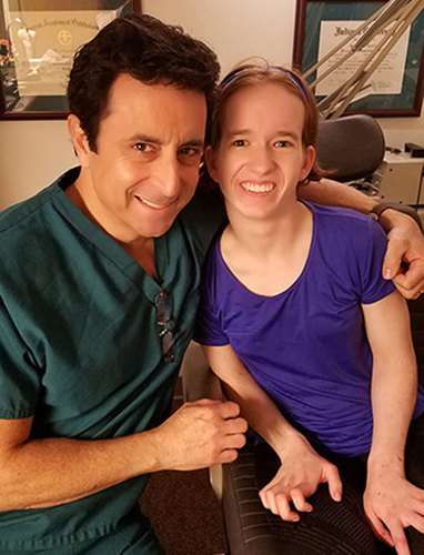 Dr. Wasserman with his arm around Maddy